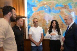 Three other passengers—Or Pardilov, Dr. Shota Musayev, and his wife Sigalit—joined Yaniv Hayun in handling the situation.